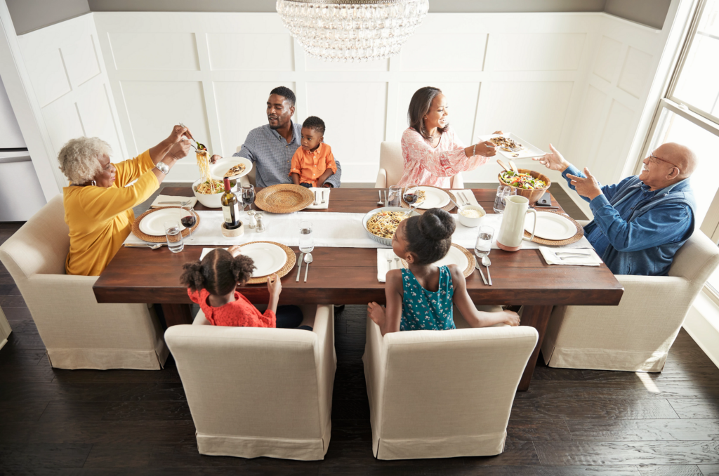 Family having breakfast at the dining table | Flooring by Wilson's Carpet Plus